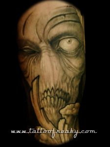 googly eyed beasty tattoo